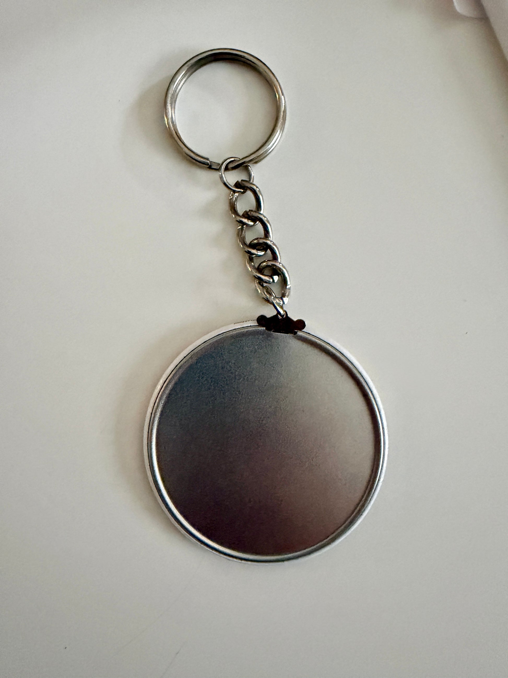 Custom photo keychain with holiday family portrait – 2.25" round keychain by Field of Magnets