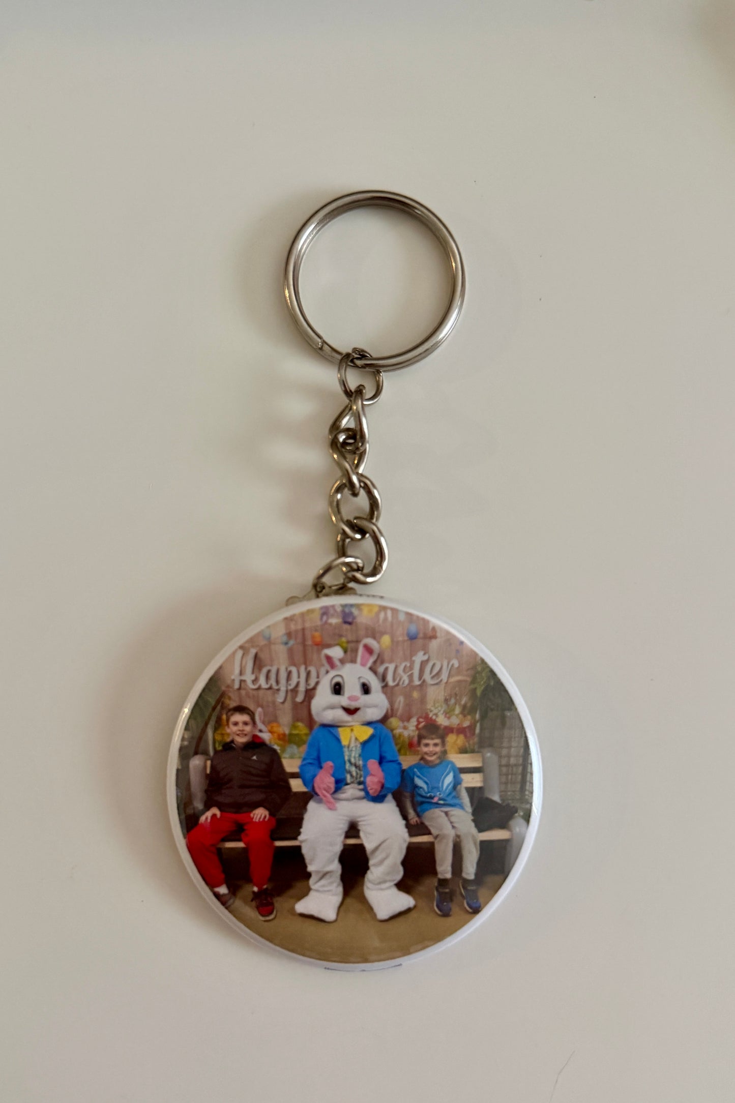 Back view of custom 2.25" round keychain showing durable metal hardware – Field of Magnets